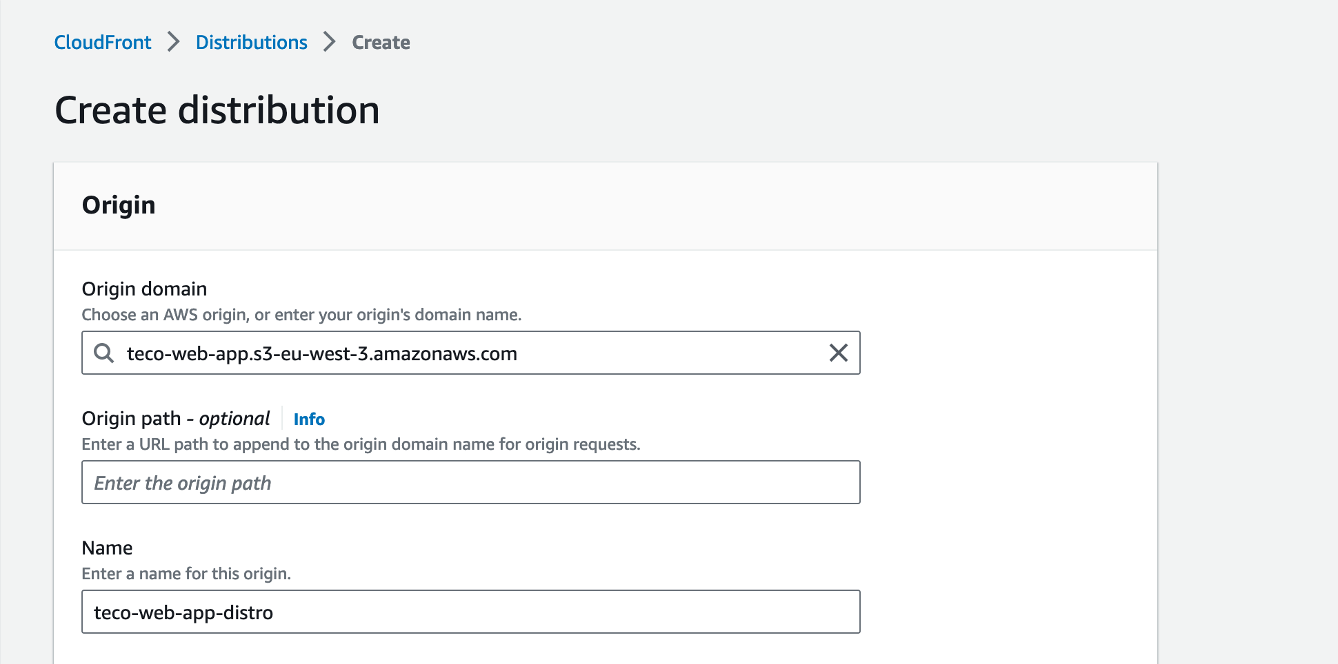 Define the CloudFront distribution origin domain and name.